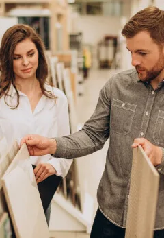 Customers choosing tile samples