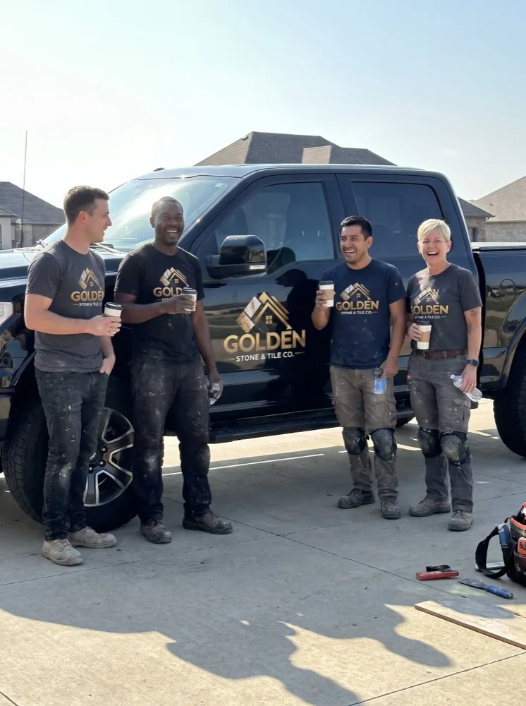 The Golden Stone & Tile Co. crew in front of their company truck
